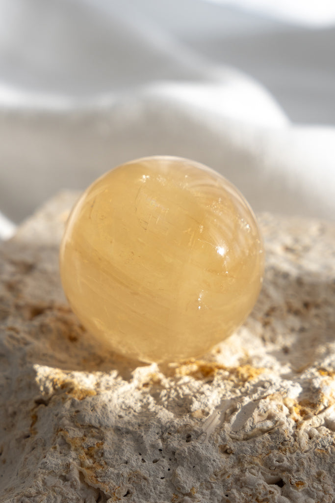 honey calcite sphere