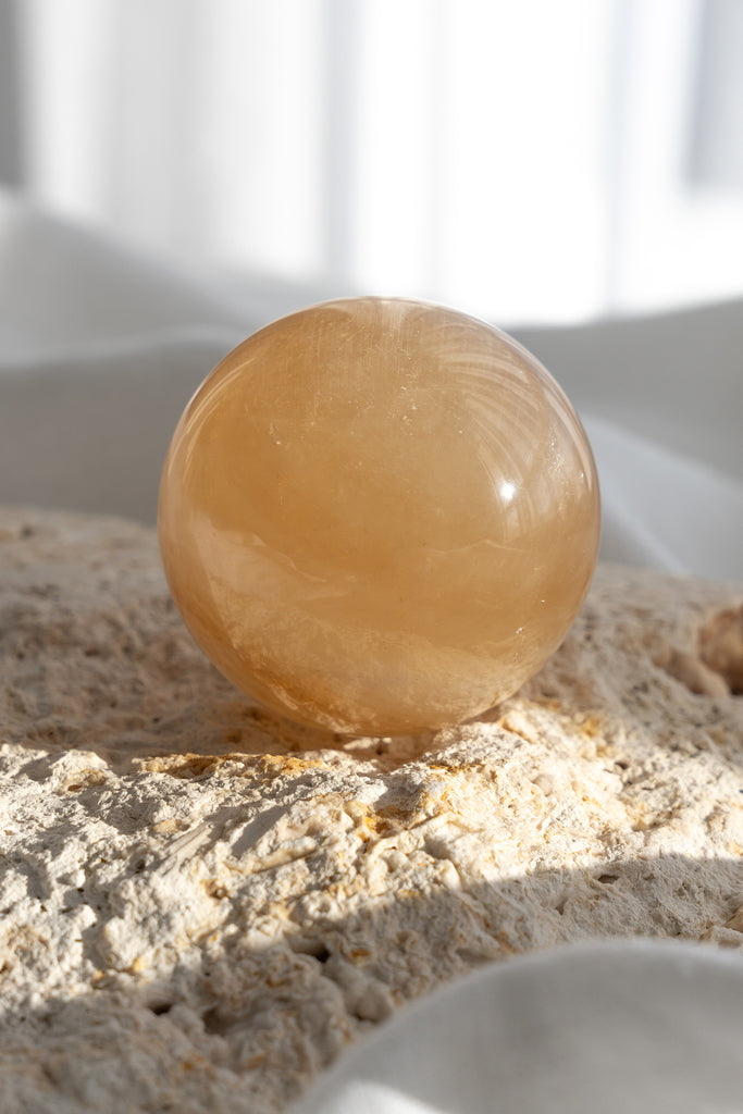 honey calcite sphere