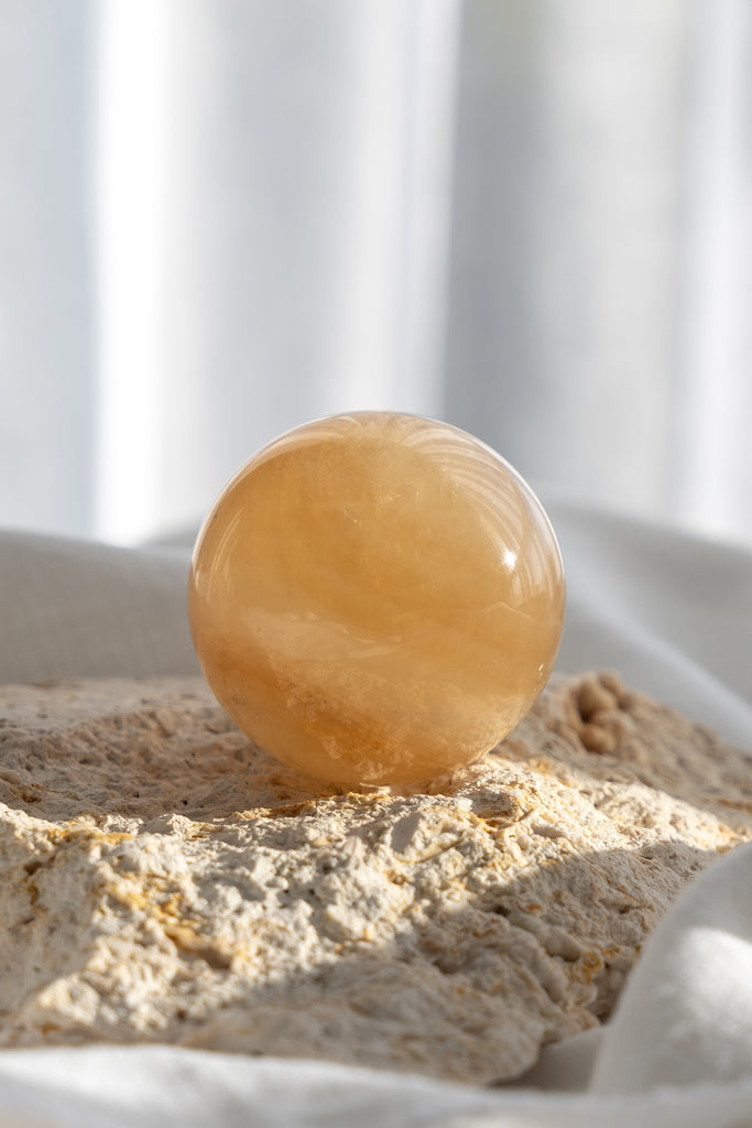 honey calcite sphere