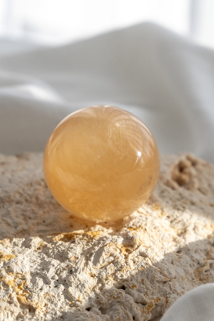 honey calcite sphere