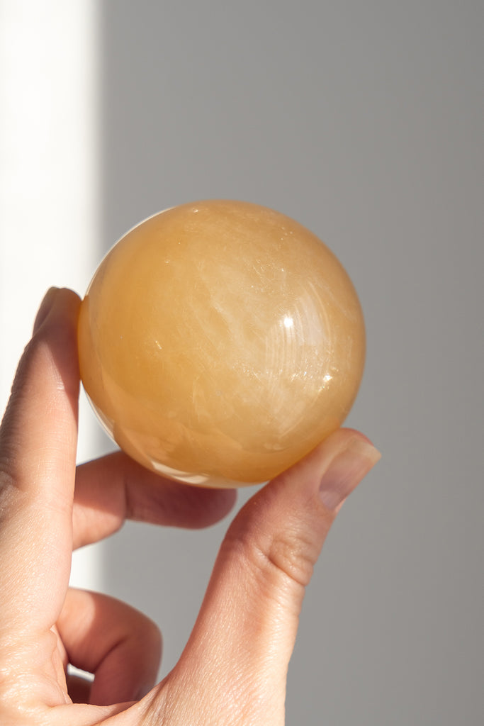 honey calcite sphere