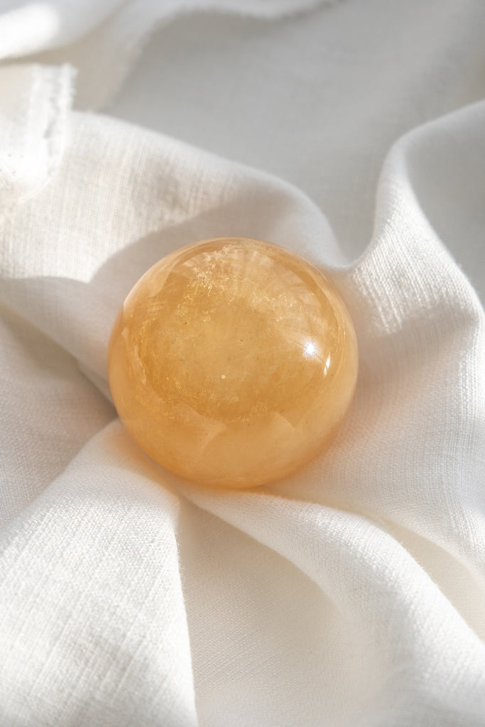 honey calcite sphere
