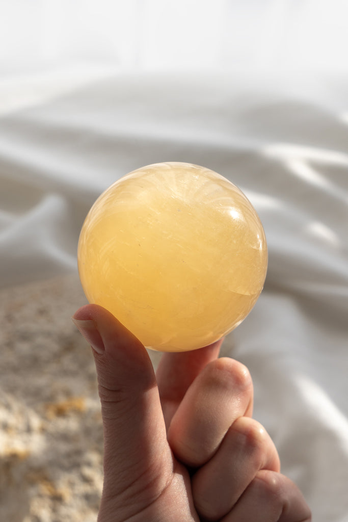 honey calcite sphere