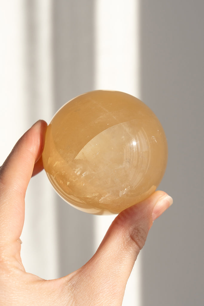 honey calcite sphere