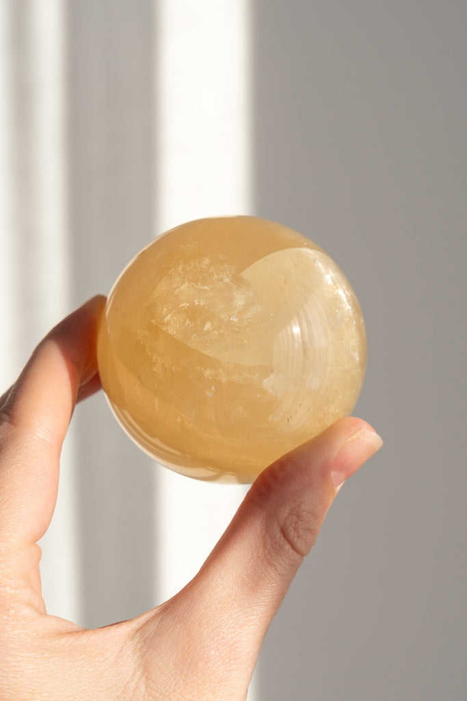 honey calcite sphere