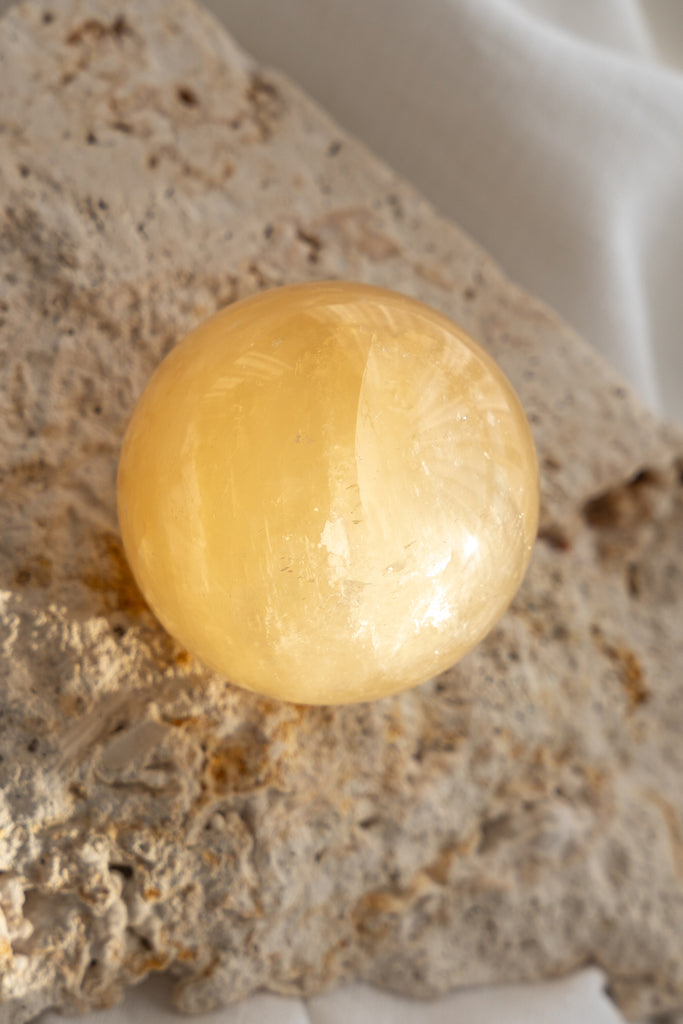 honey calcite sphere
