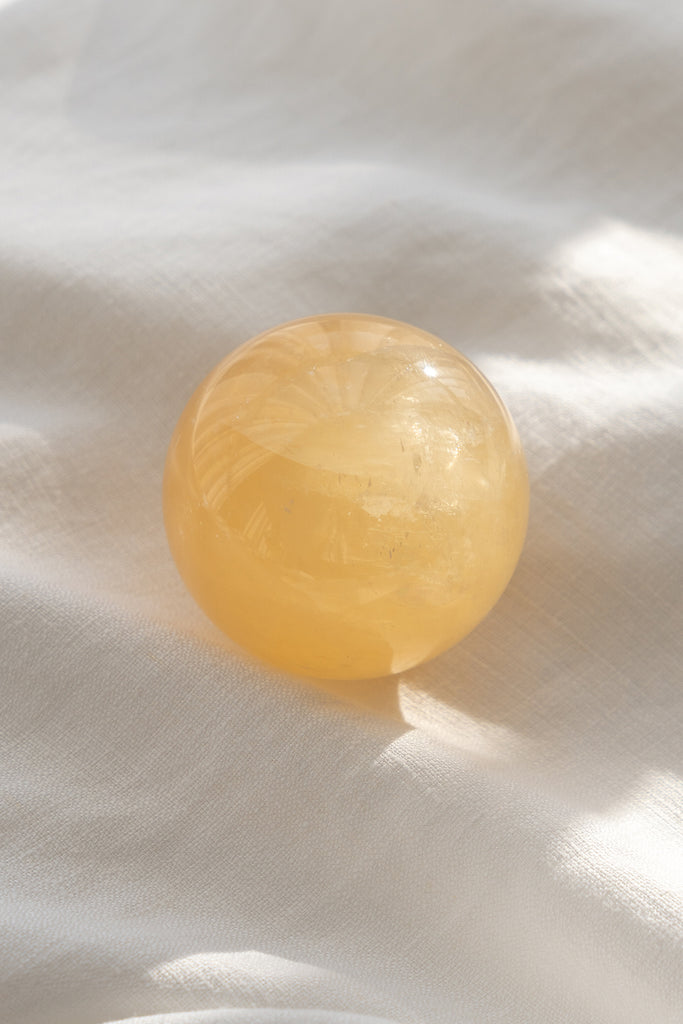 honey calcite sphere