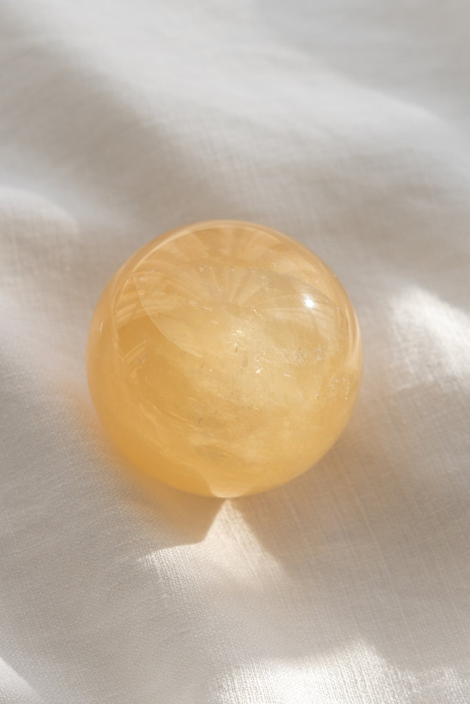 honey calcite sphere