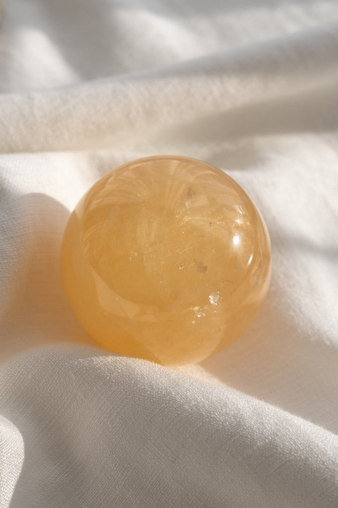 honey calcite sphere