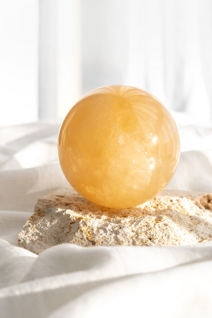 honey calcite sphere