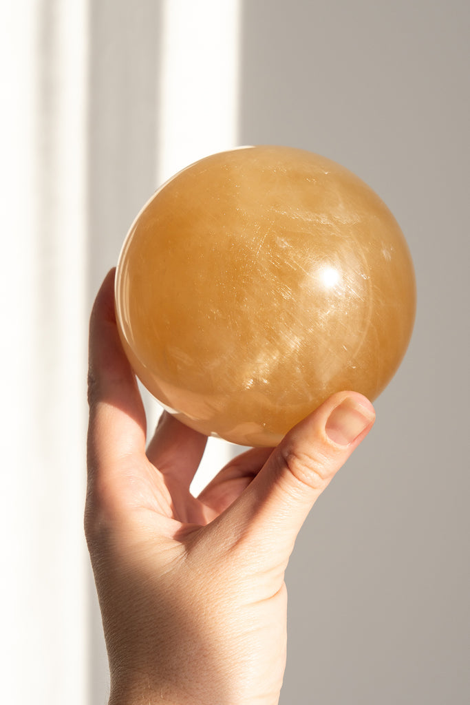 honey calcite sphere