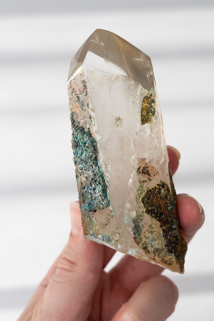 polished Quartz point with Chrysocolla