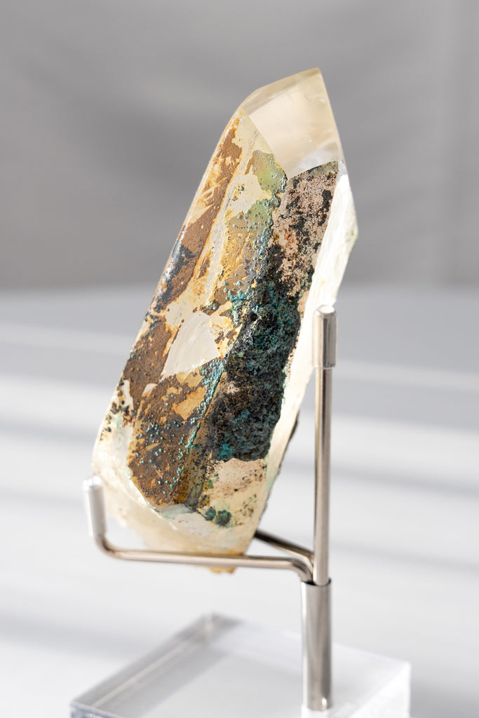 polished Quartz point with Chrysocolla