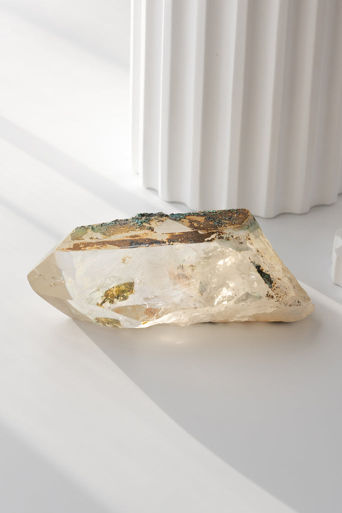 polished Quartz point with Chrysocolla