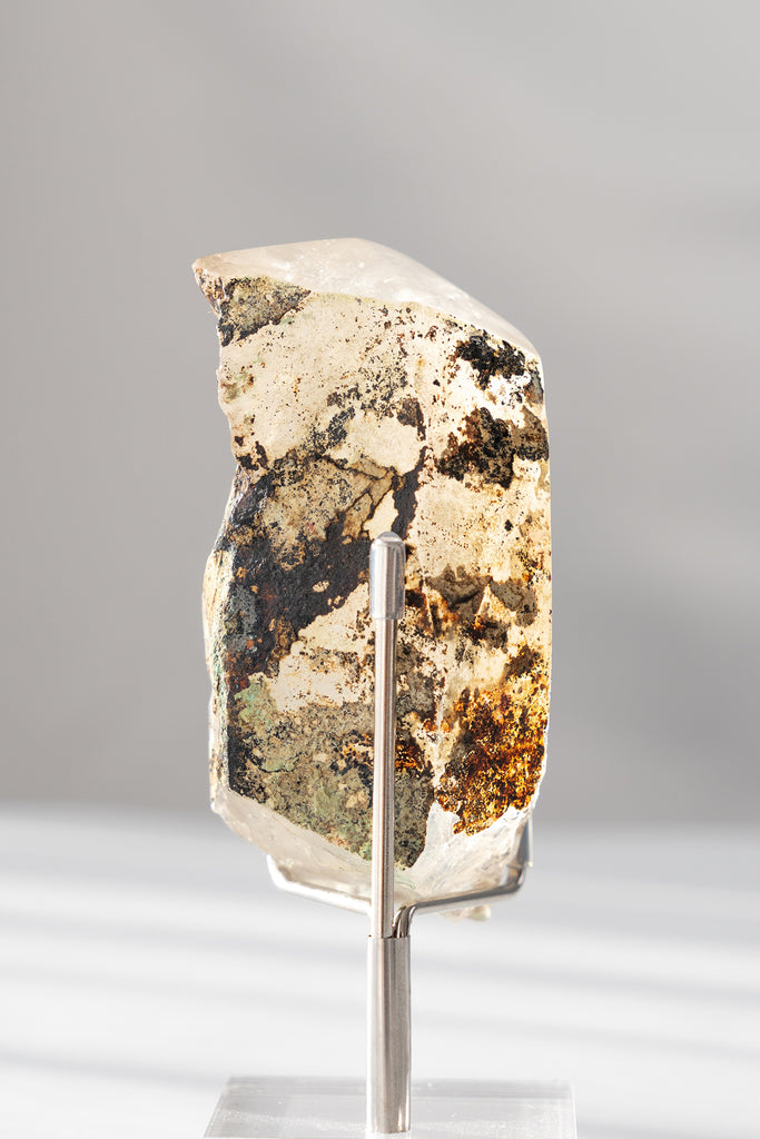 polished Quartz point with Chrysocolla