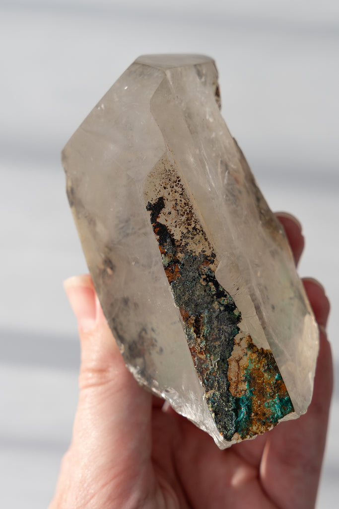 polished Quartz point with Chrysocolla
