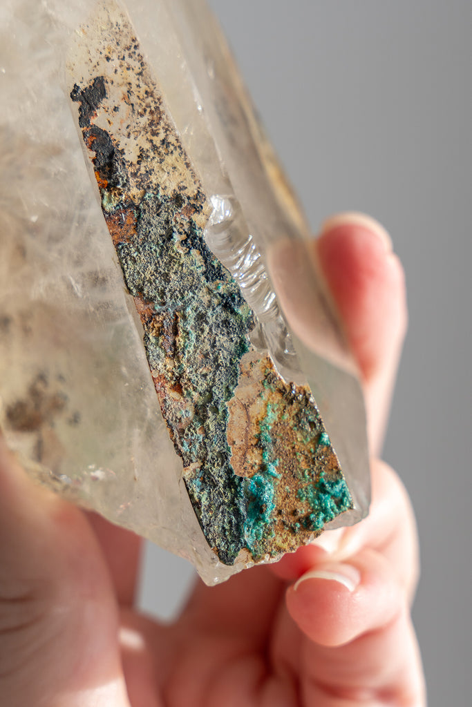 polished Quartz point with Chrysocolla