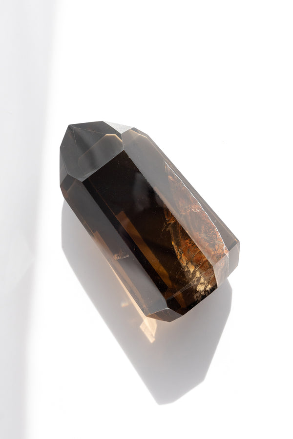 Faceted gemstone on a white background