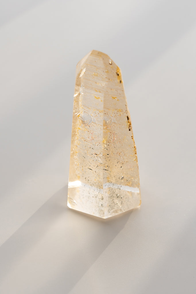 Included quartz obelisk raw back