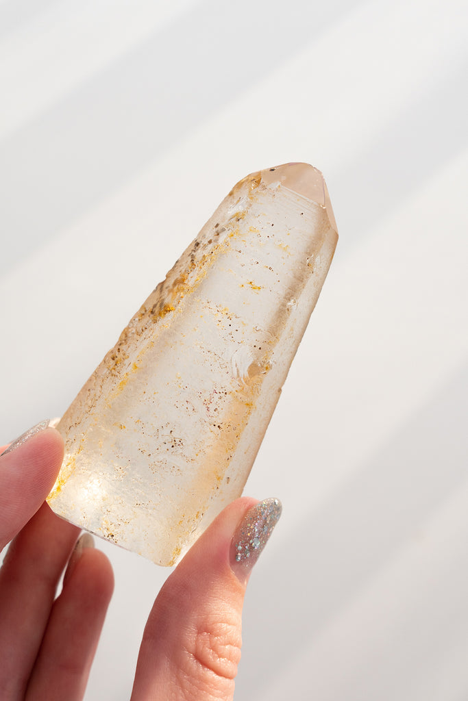 Included quartz obelisk raw back