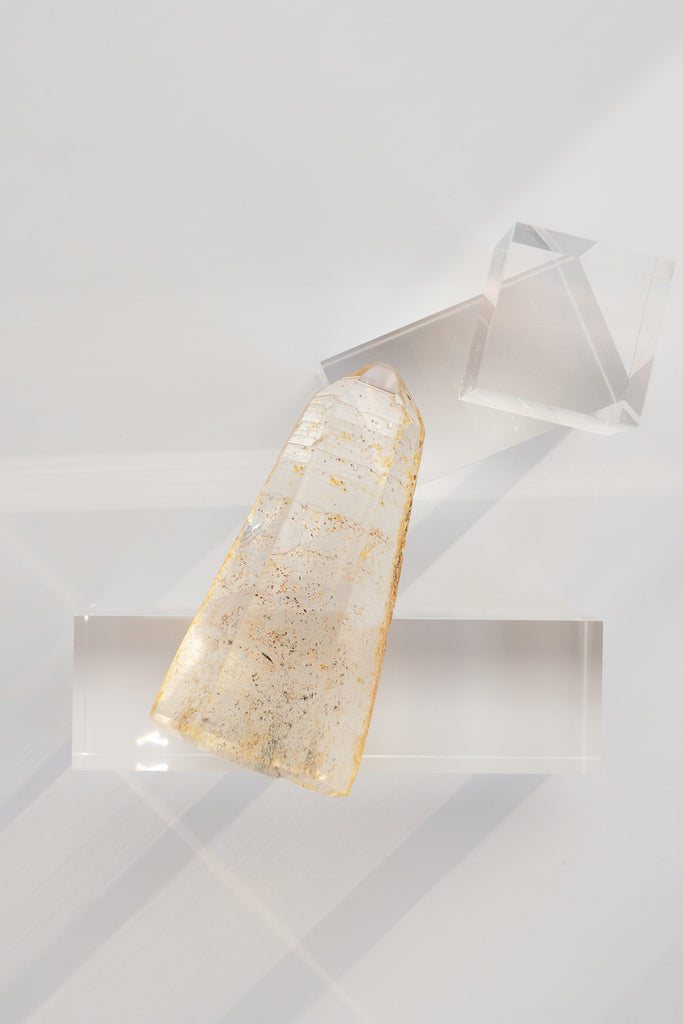 Included quartz obelisk raw back