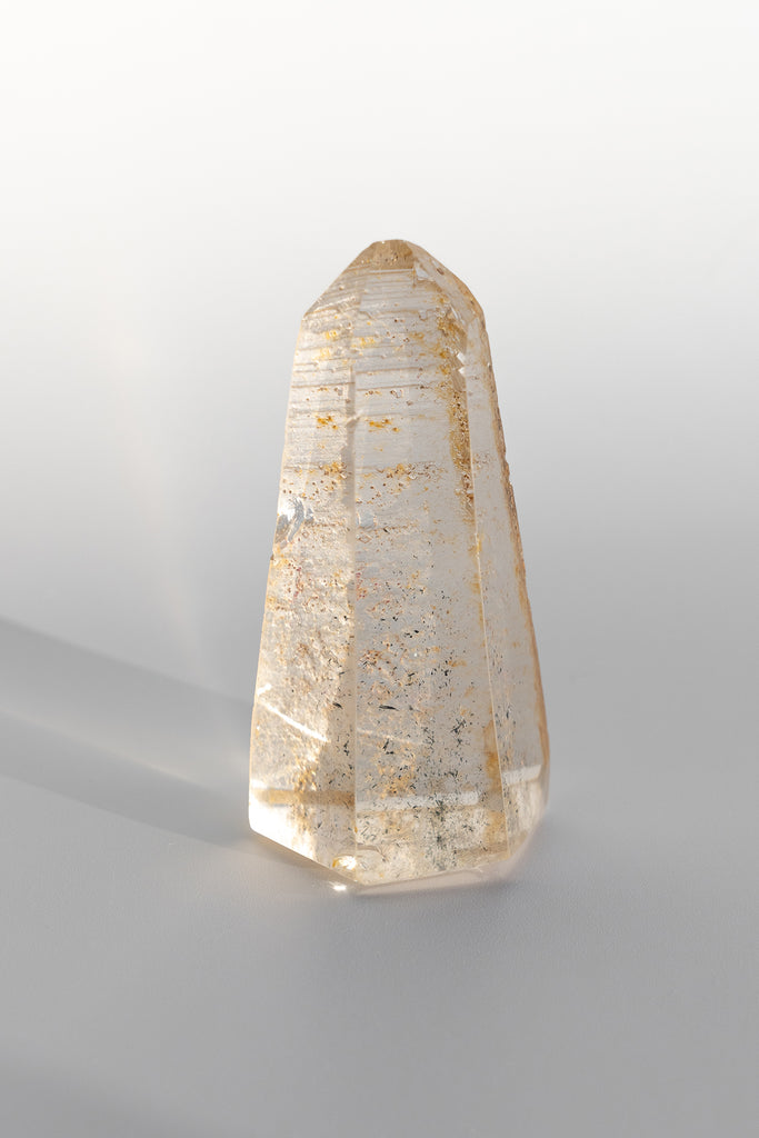 Included quartz obelisk raw back