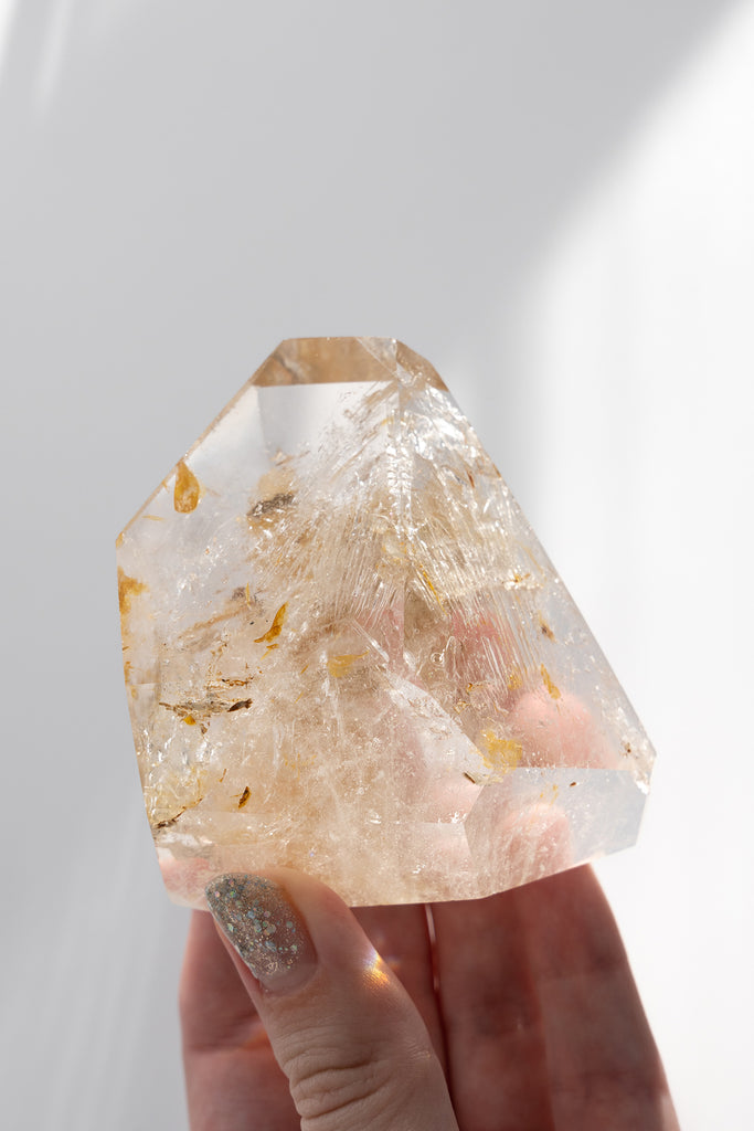 Included Quartz faceted golden healer