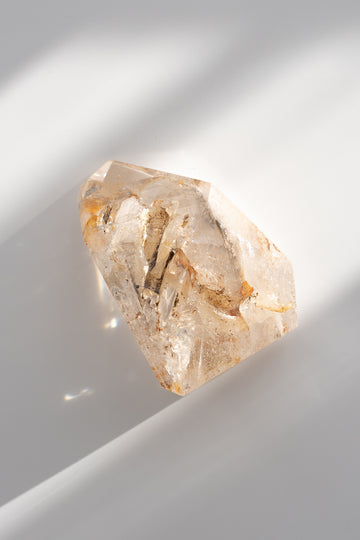 Included Quartz Faceted Point