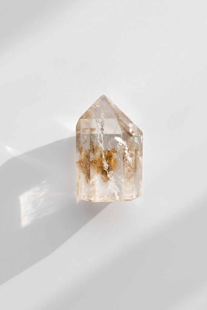 Included smokey quartz point