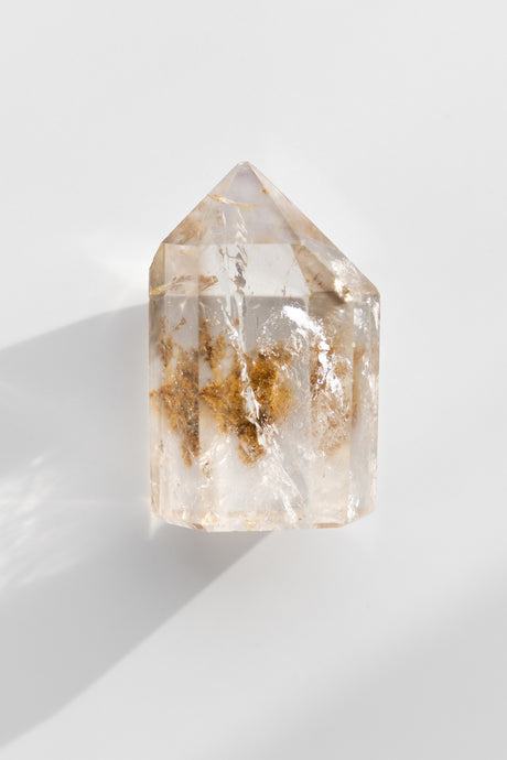 Included smokey quartz point