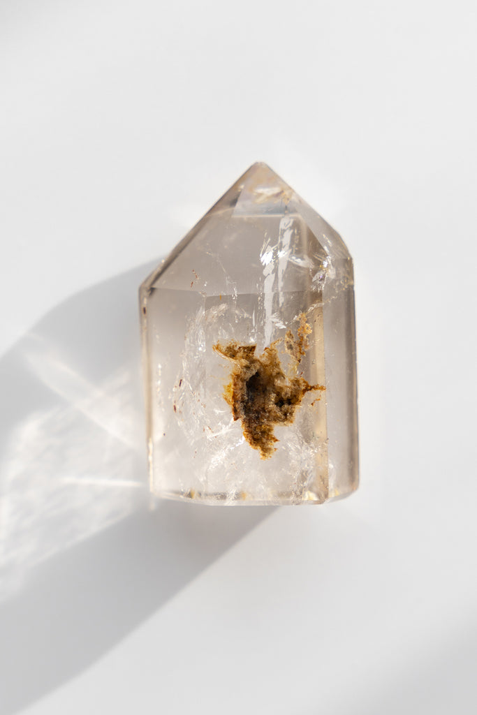 Included smokey quartz point