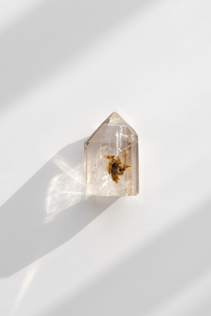 Included smokey quartz point