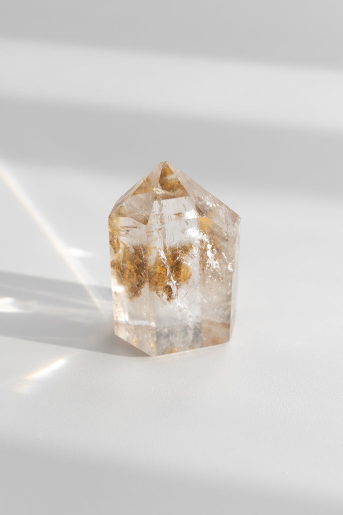 Included smokey quartz point