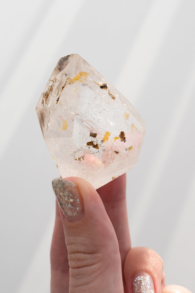 Included Quartz Faceted Point